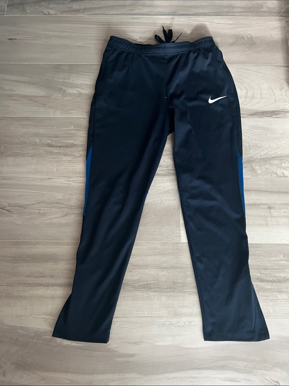 Nike Black Track Pants with Blue Side Panels and White Swoosh